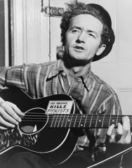 Woody Guthrie. Because 'folk'. And frankly, just 'because'.